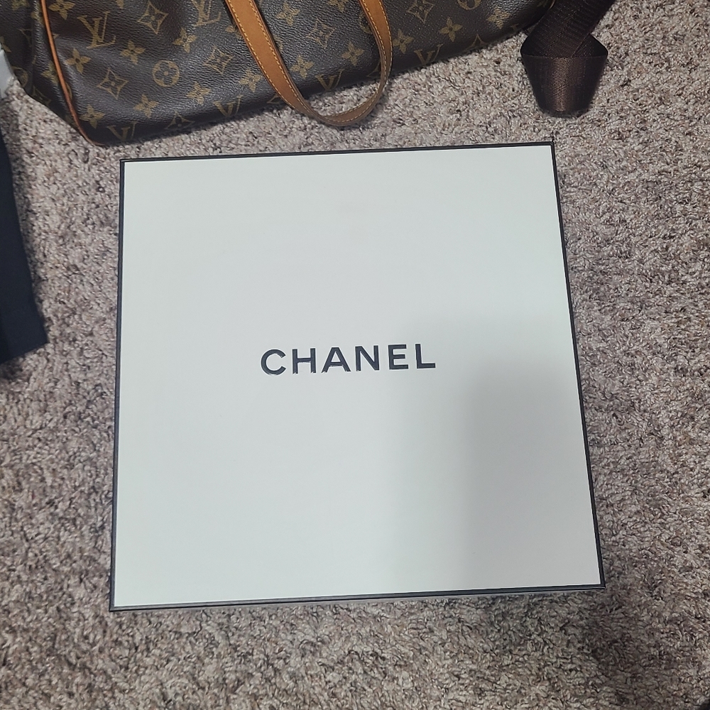 Empty chanel box, camellia flower, & card